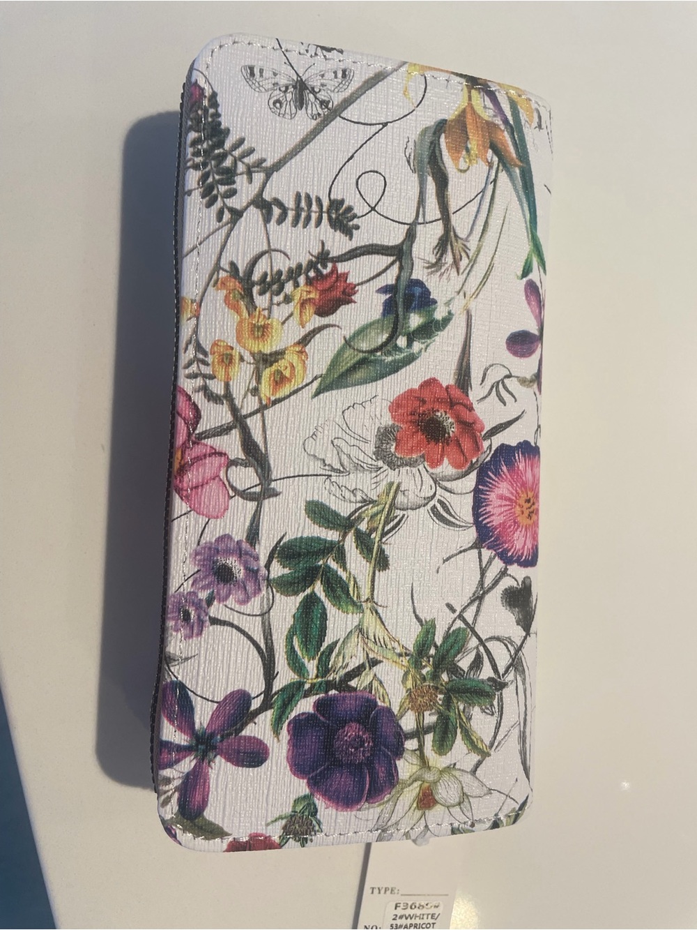 Anthropologie White Floral Wallet Phone Case with Multicolor Blooms